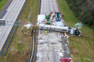 A Kenan Advantage Group gasoline tanker spilled thousands of gallons of fuel onto Interstate 59 in Birmingham, according to officials. The fuel made its way to Village Creek, which flows nearby. Credit: Courtesy of Birmingham Fire and Rescue Service