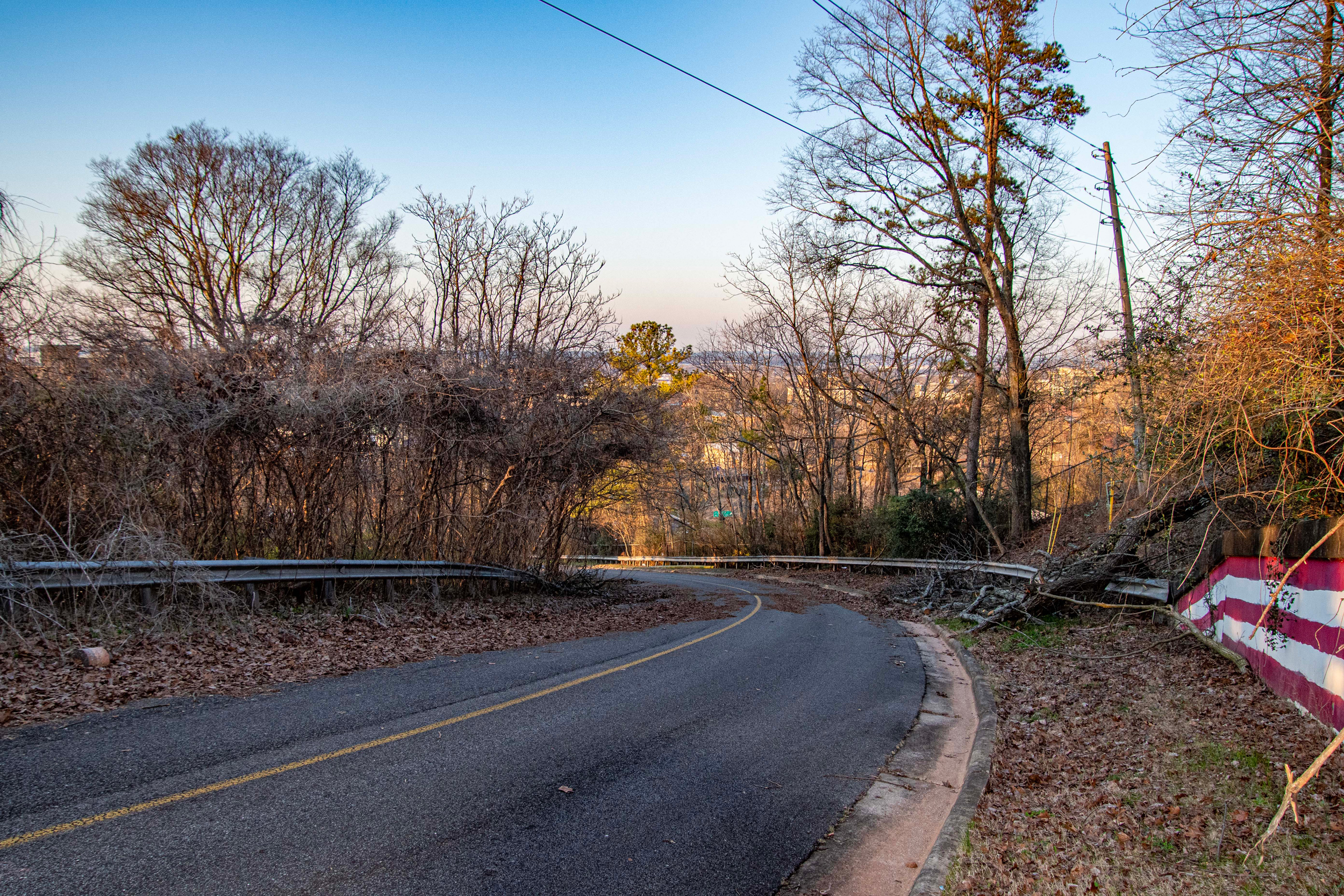 Birmingham's Woodcrest Road has been closed for over a year following concerns about slope settlement. The city said there is currently no timeline for its reopening. Credit: Lee Hedgepeth/Inside Climate News