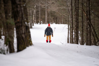 A skier makes their way through the trails at the Korkki Nordic Ski Center near Duluth, Minn. Credit: Alex Kormann/Star Tribune via Getty Images
