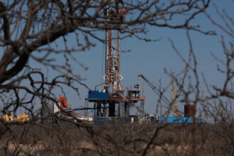 An oil drilling rig works in the Permian Basin oil field in Midland, Texas. Credit: Joe Raedle/Getty Images