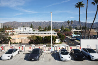 Tesla electric cars recharge at a Tesla Supercharger station on Jan. 16 in Burbank, Calif. Credit: Mario Tama/Getty Images