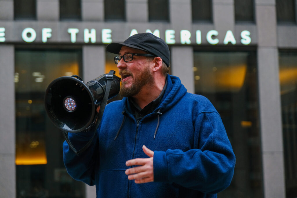 James Hiatt, founder of For a Better Bayou, spoke outside of Tokio Marine's office in Manhattan. "We know that continued dependence on fossil fuels will not be better for our children," said Hiatt. Credit: Keerti Gopal/Inside Climate News