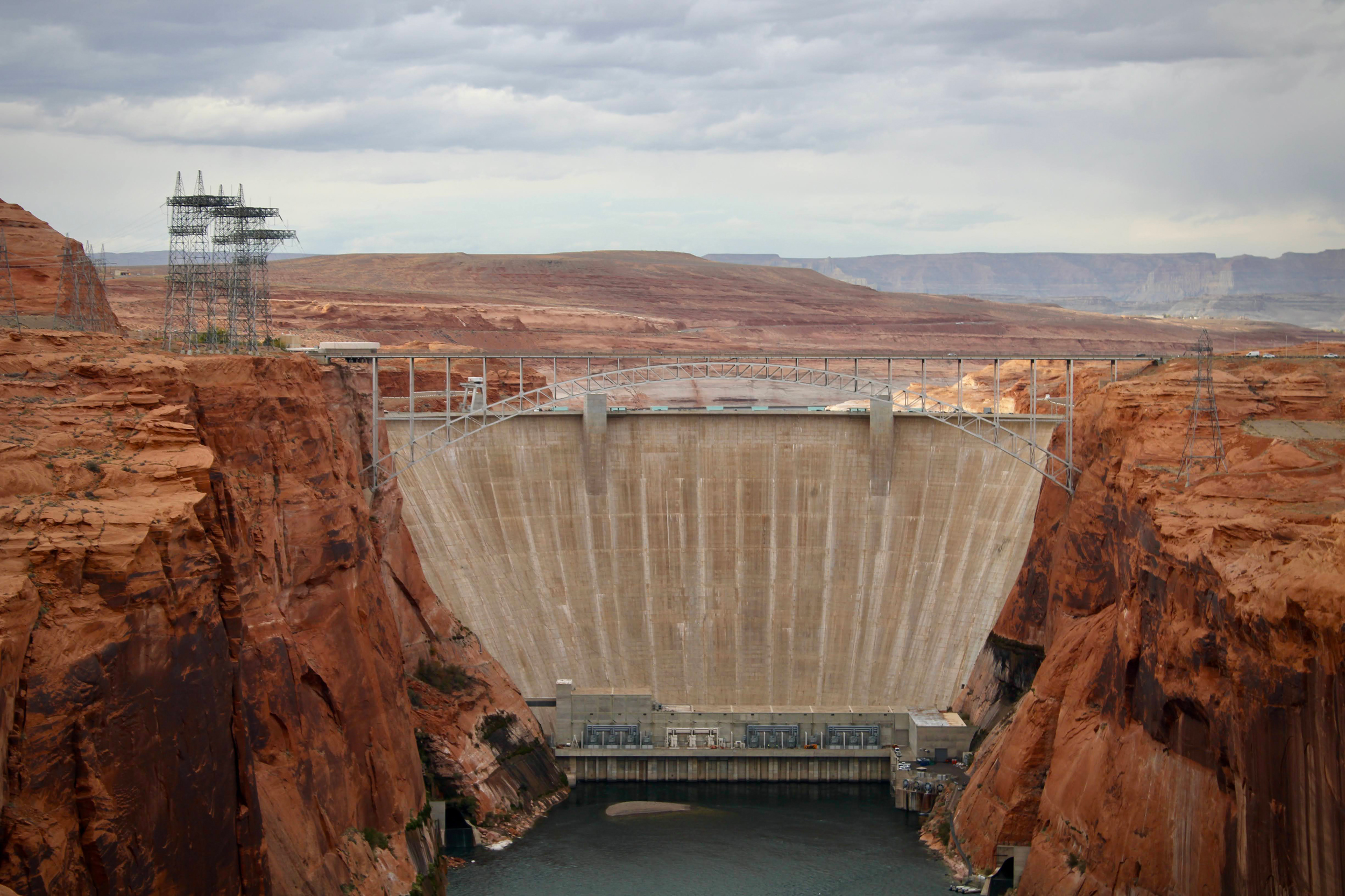 Glen Canyon Dam holds back Lake Powell on Nov. 2, 2022. States upstream and downstream of the dam have different ideas about how to manage the amount of water released from the reservoir, which has become a key sticking point in ongoing negotiations about the Colorado River's future. Credit: Alex Hager/KUNC