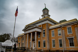 Workers at the Hale County Courthouse in Greensboro, Alabama, have found themselves facing a choice: work in uncomfortable conditions or use personal time to avoid chilly inside temperatures. Credit: Lee Hedgepeth/Inside Climate News